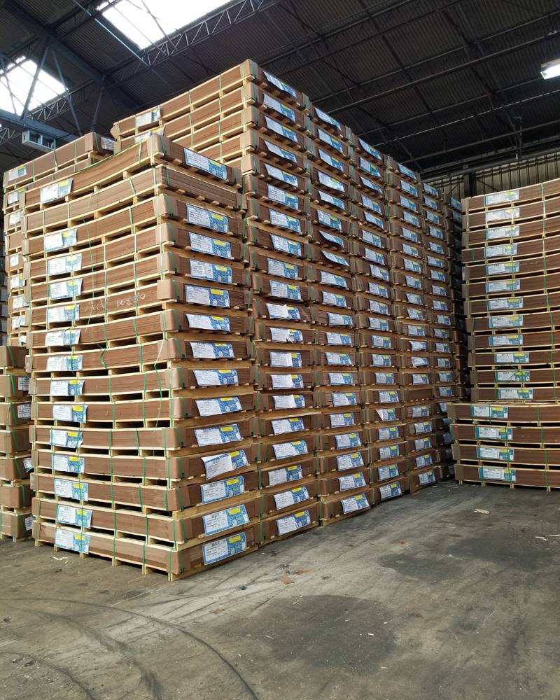 Units stacked high in the warehouse