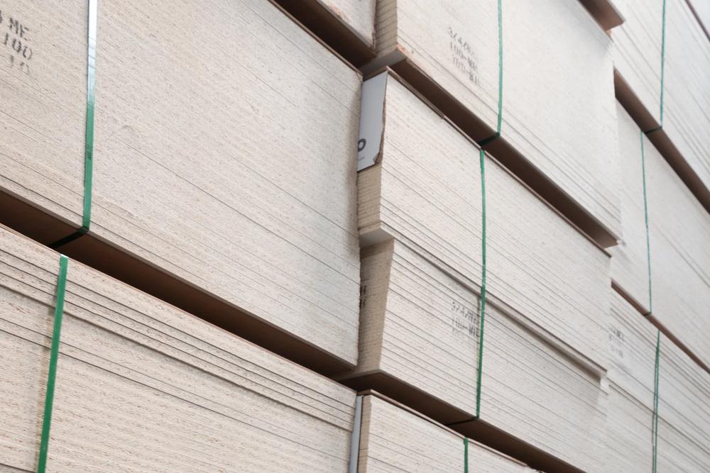 Units of particle board in the warehouse