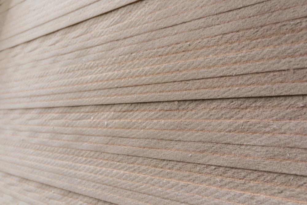 Edges of stacked softboard insulation board